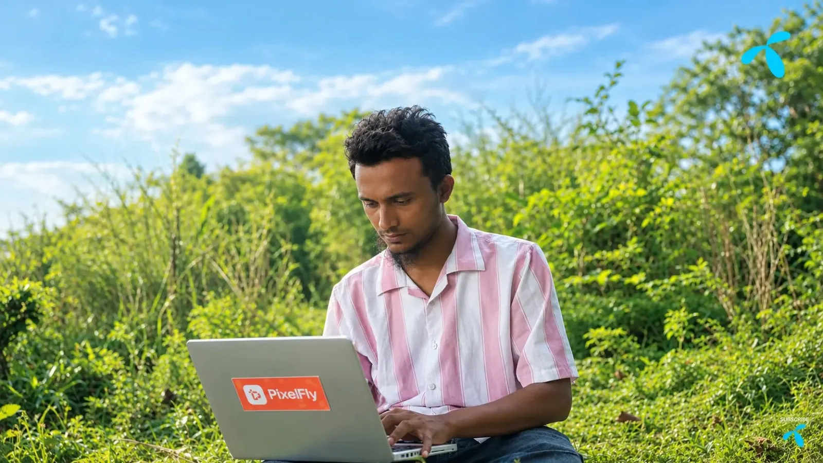 A laptop with a PixelFly sticker in Grameenphone's documentary about Jashore's tech scene